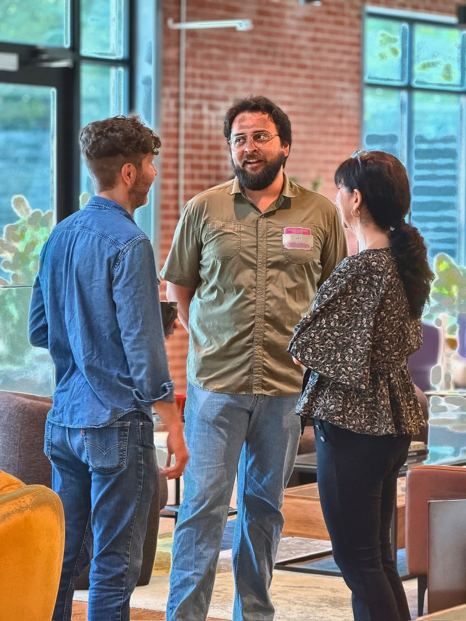 Community members talking together after a Cafecito Tech gathering
