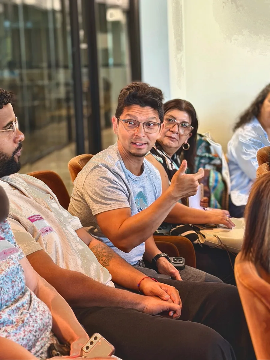 Community members taking part in a conversation at Cafecito Tech